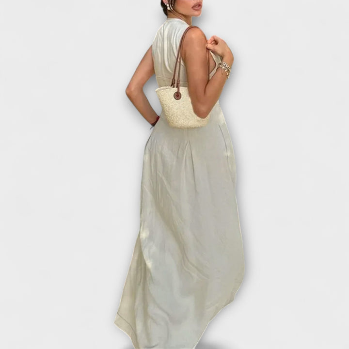 Kratka haljina bez rukava s plisiranjem i uskim krojem midi