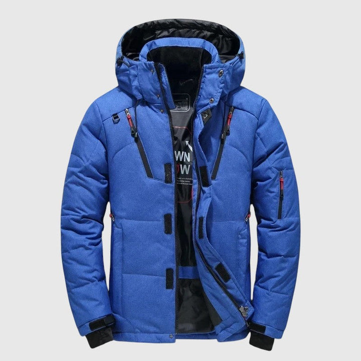 André – Padded jakna s kapuljačom i tehničkim detaljima